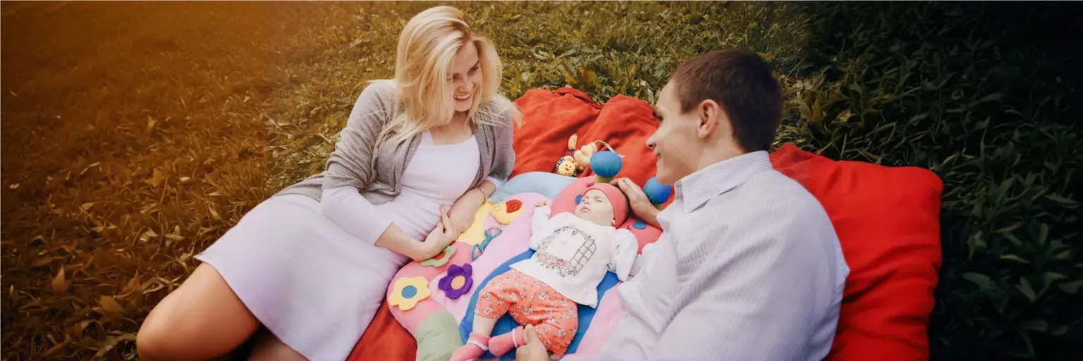 Close-up of an infant with a red vascular birthmark on the skin, highlighting hemangioma symptoms and treatment options.