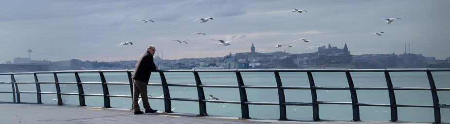 Close-up of an eye with drooping eyelid, illustrating ptosis caused by ocular myasthenia gravis, an autoimmune neuromuscular disorder.