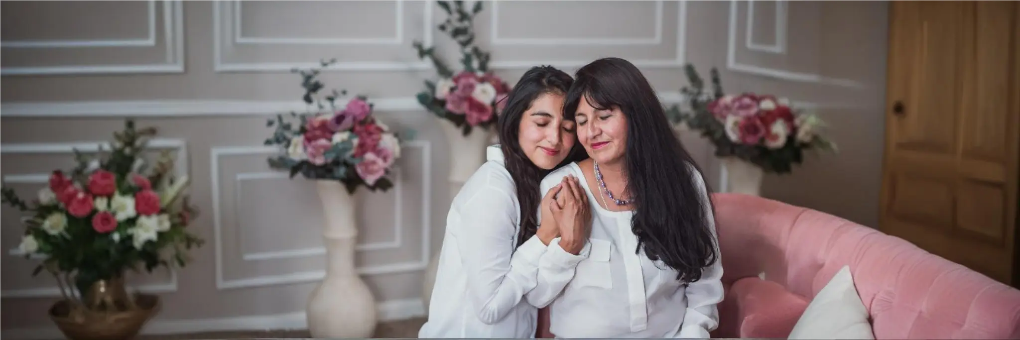 Close-up of progesterone capsules and a medical chart highlighting hormone therapy benefits and uses.