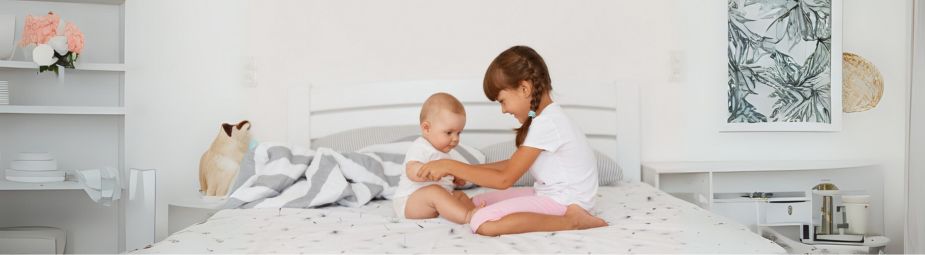 A person holding their neck in discomfort, illustrating torticollis symptoms and the need for effective treatment.