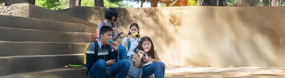 A child sitting alone, looking distressed, symbolizing the emotional challenges of disruptive mood dysregulation disorder.