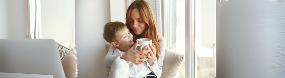 A child engaging in a speech therapy session to address social communication disorder symptoms.