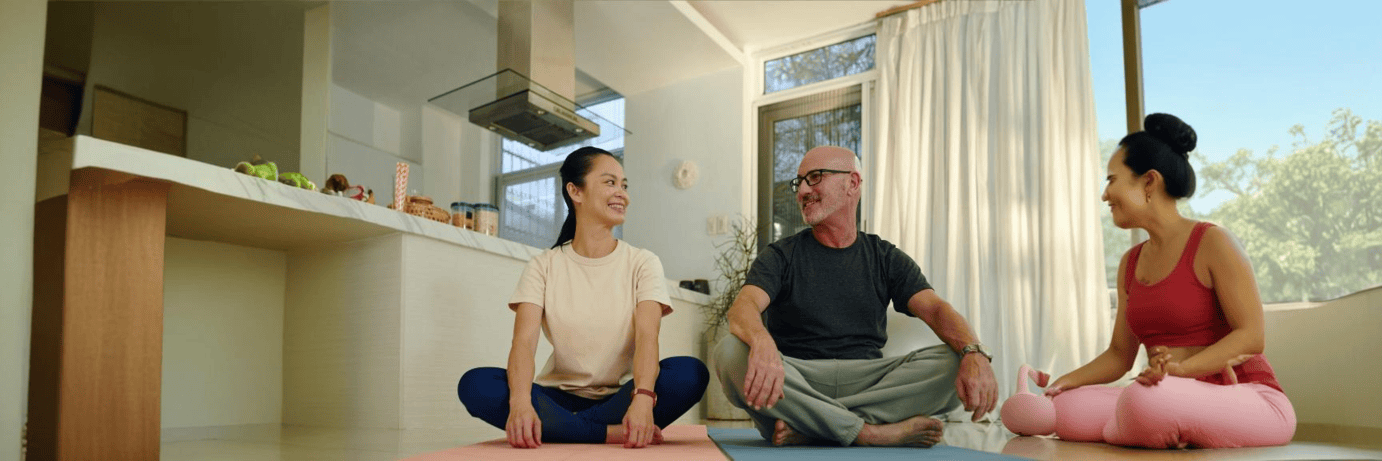 Dermatologist performing a skin ultrasound on a patient's arm using a handheld ultrasound device.