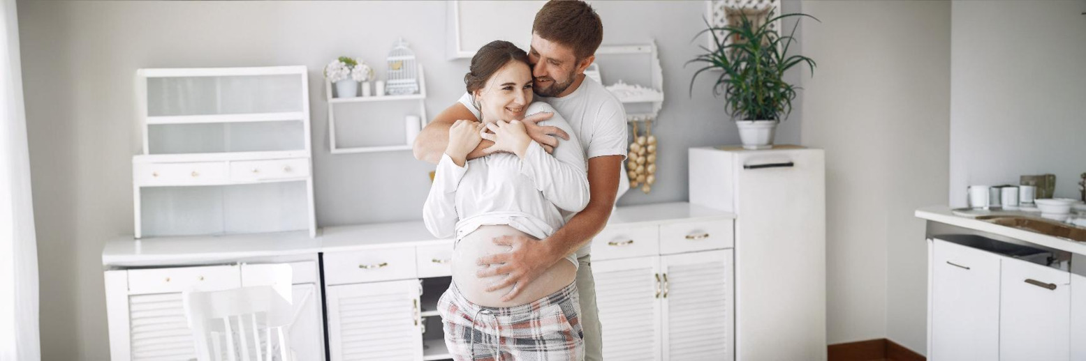 A medical professional performing a transvaginal ultrasound to examine female pelvic organs for diagnostic purposes.