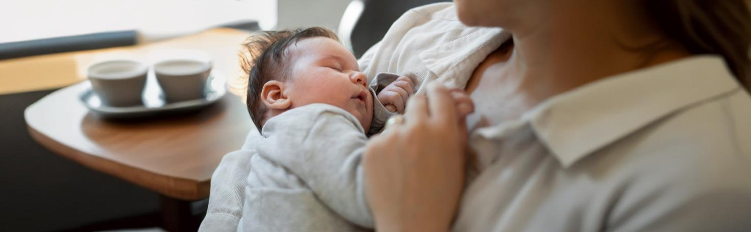 A healthcare professional uses near-infrared spectroscopy (NIRS) to monitor a patient's brain oxygenation and blood flow non-invasively.