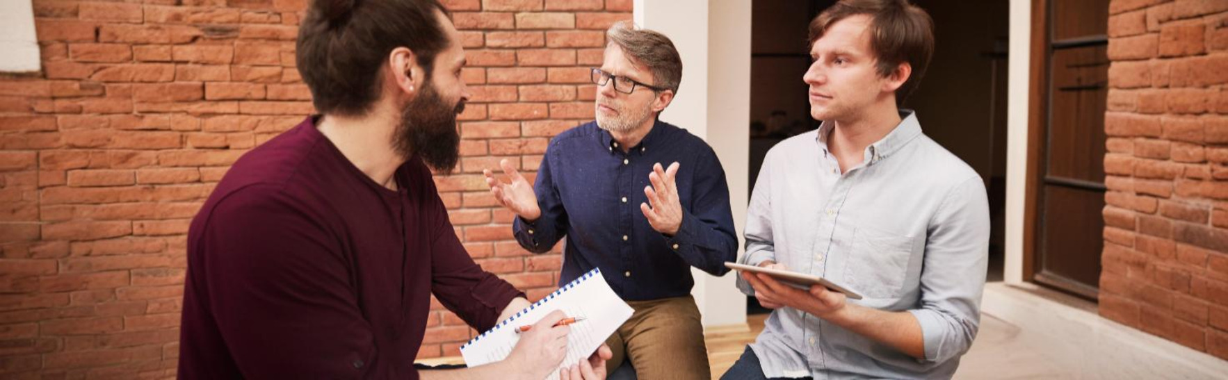 Surgeon implanting a total artificial heart (TAH) in a patient with end-stage cardiomyopathy.