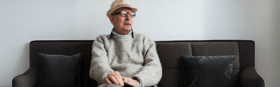 Medical illustration of an artificial urinary sphincter used for stress incontinence treatment.