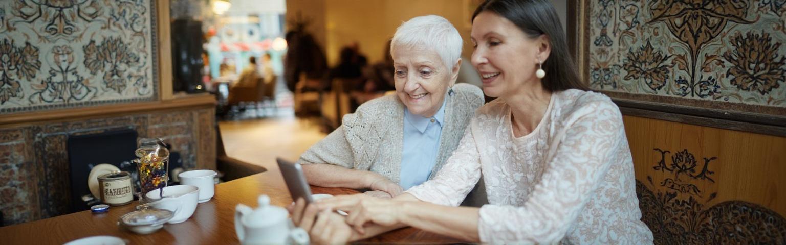 Surgeon discussing breast cancer surgery options with a patient, including lumpectomy and mastectomy.