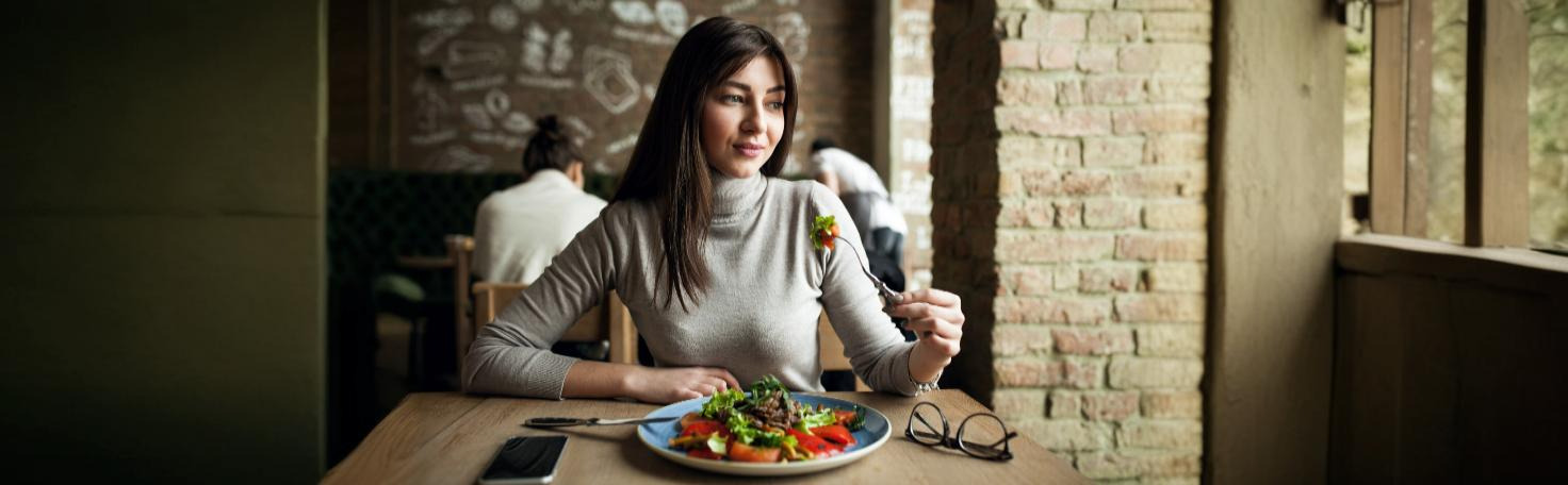 A healthcare professional reviews an Eating Disorder Inventory (EDI) assessment form to evaluate eating disorder symptoms.