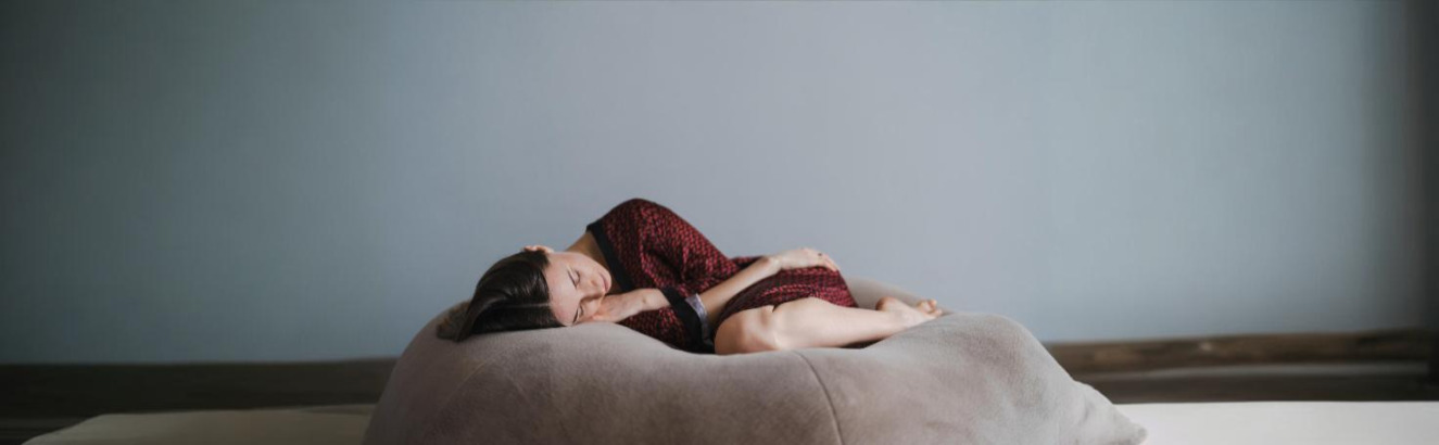 A doctor conducting a depression screening with a patient using a standardized questionnaire in a primary care setting.