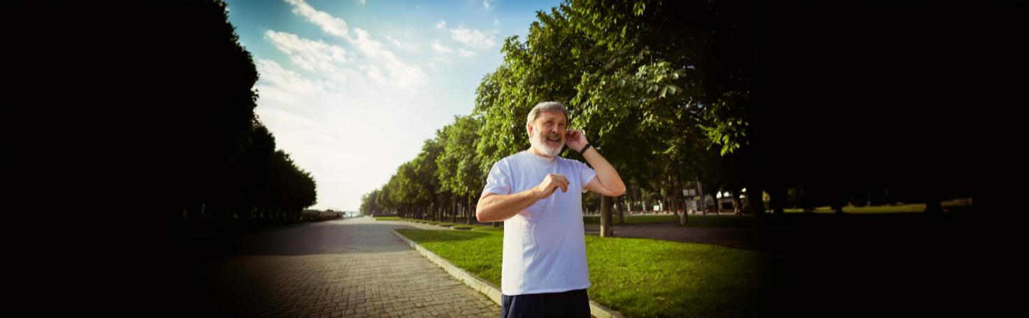 Doctor performing cryotherapy on a patient's skin to treat actinic keratosis using liquid nitrogen.