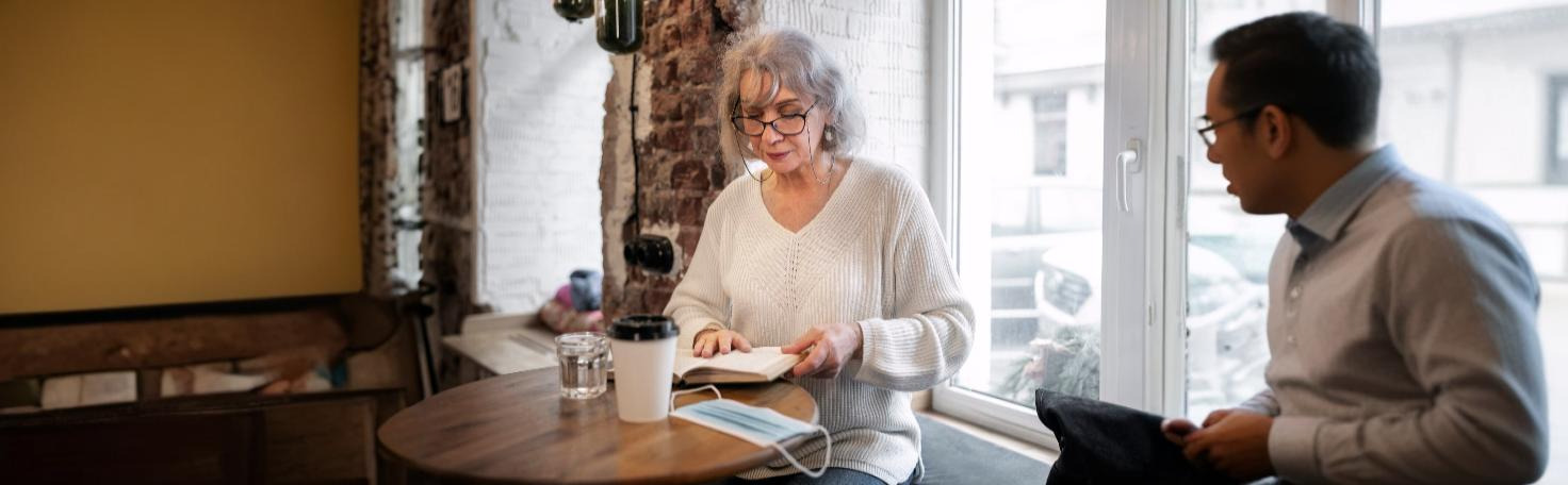 Doctor performing endovenous laser therapy on a patient's leg to treat varicose veins.