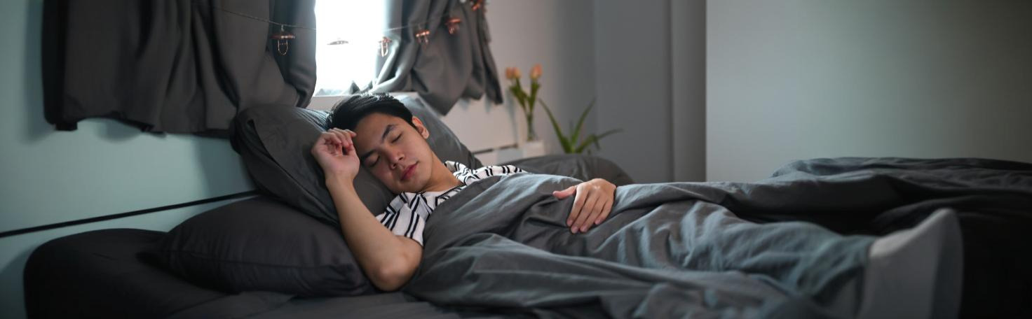 A person filling out the Epworth Sleepiness Scale questionnaire to assess daytime sleepiness and potential sleep disorders.