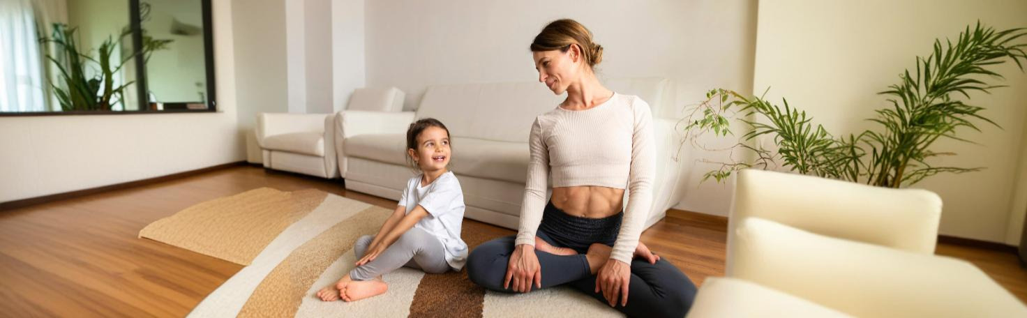 A patient performs the heel-to-shin test, a neurological exam assessing cerebellar function, balance, and motor coordination.