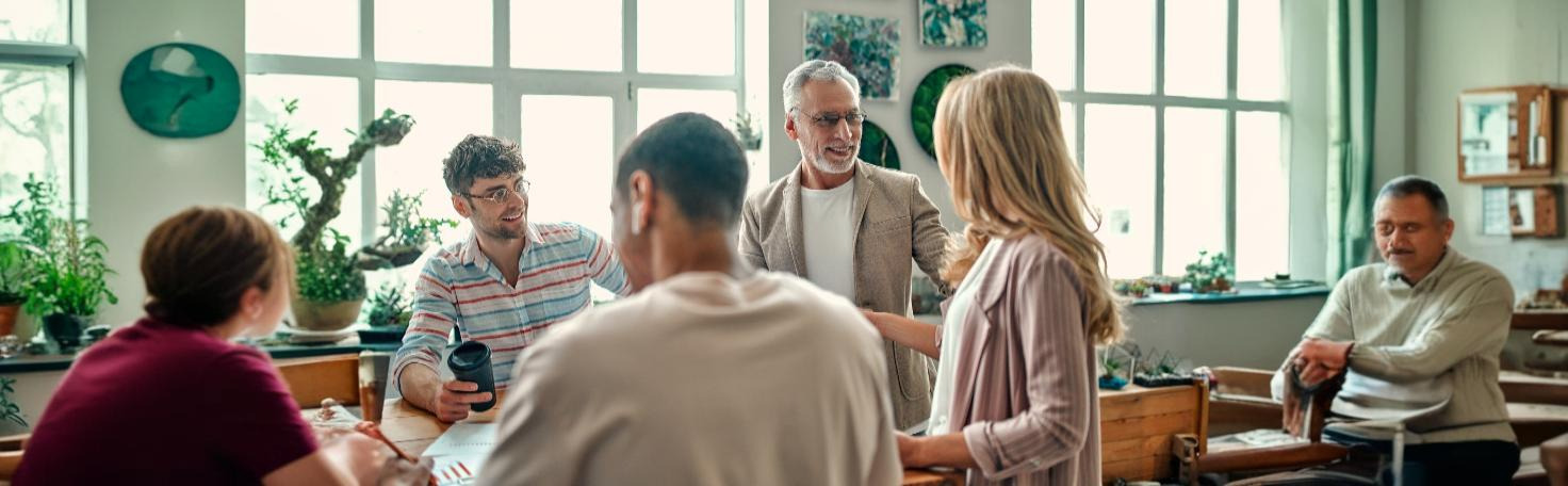 Doctor reviewing Huntington disease genetic test results with a patient, explaining diagnosis and genetic risk factors.