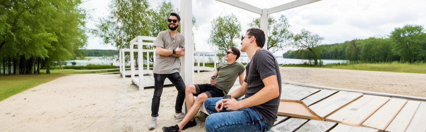 Surgeon performing radical inguinal orchiectomy for testicular cancer treatment in a sterile operating room.