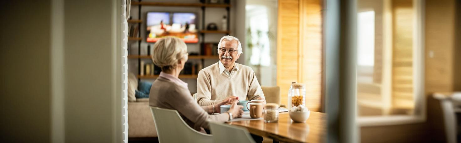 A healthcare professional performing phlebotomy to treat Polycythemia Vera by drawing blood to reduce hematocrit levels.