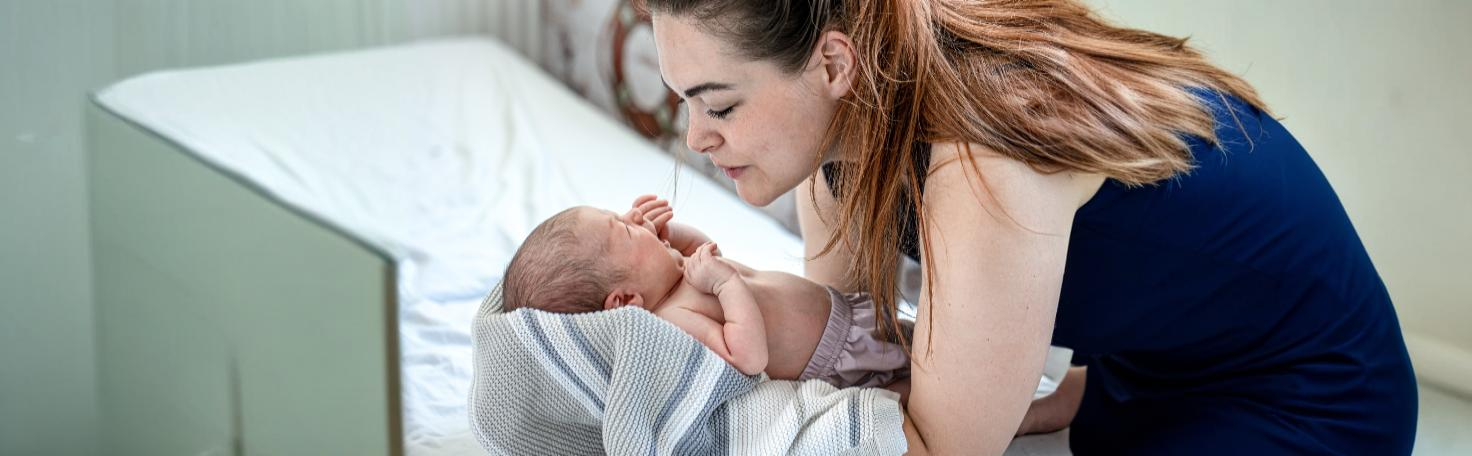 A newborn under blue light phototherapy to treat jaundice, reducing bilirubin levels safely and effectively.