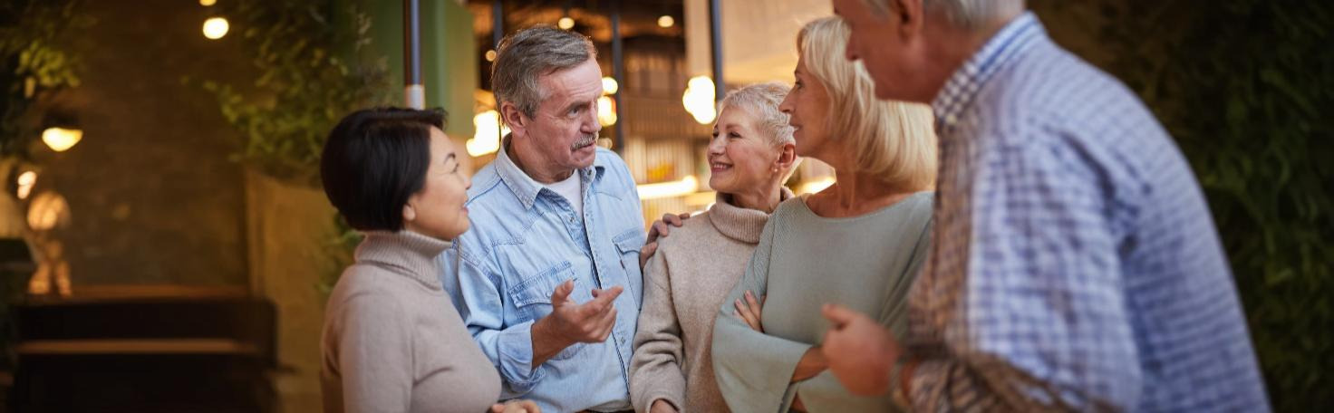 Surgeons performing neuroendocrine tumor resection in an operating room setting.