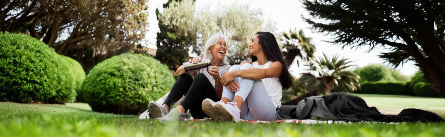 Surgeon discussing breast cancer revision surgery options with a patient in a medical consultation.