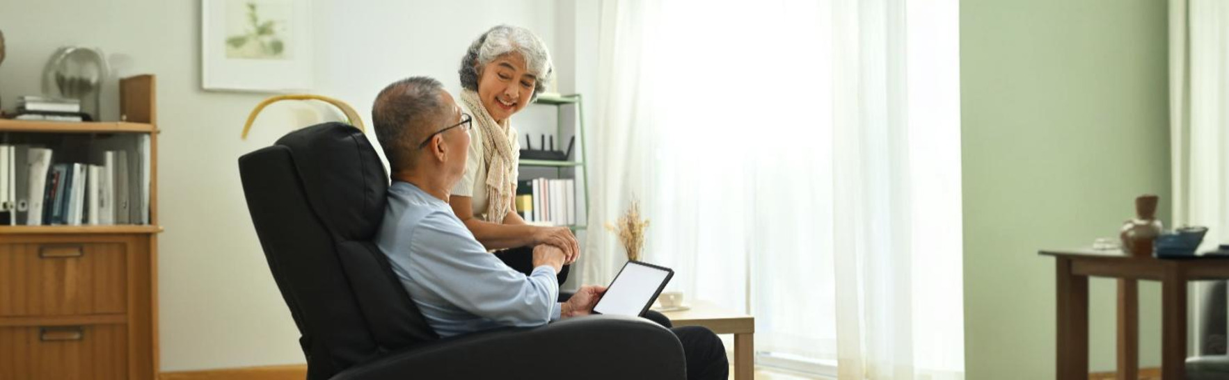 Medical illustration of thrombectomy for Peripheral Artery Disease, showing catheter-based blood clot removal in leg arteries.