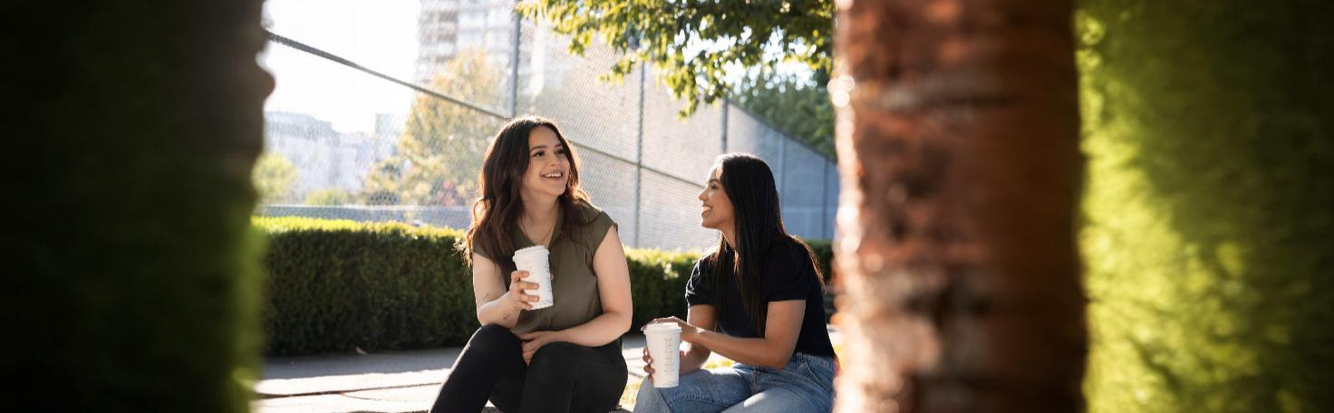 A patient completing a self-report symptom questionnaire to track health conditions and aid in medical evaluation.