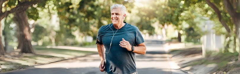 A person performing the Valsalva maneuver by exhaling against a closed airway to regulate heart rate and blood pressure.